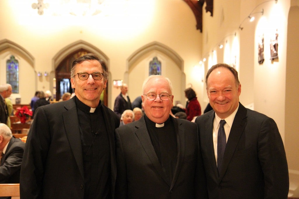 Rev. Kevin O'Brien S.J., Rev. Kevin Hollenbach, S.J., and Georgetown President John DeGioia after the lecture.