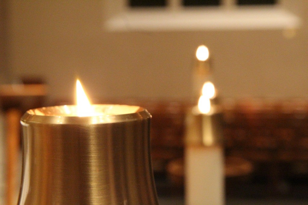 Candles lit by the Campus Ministry Chaplains during the service.