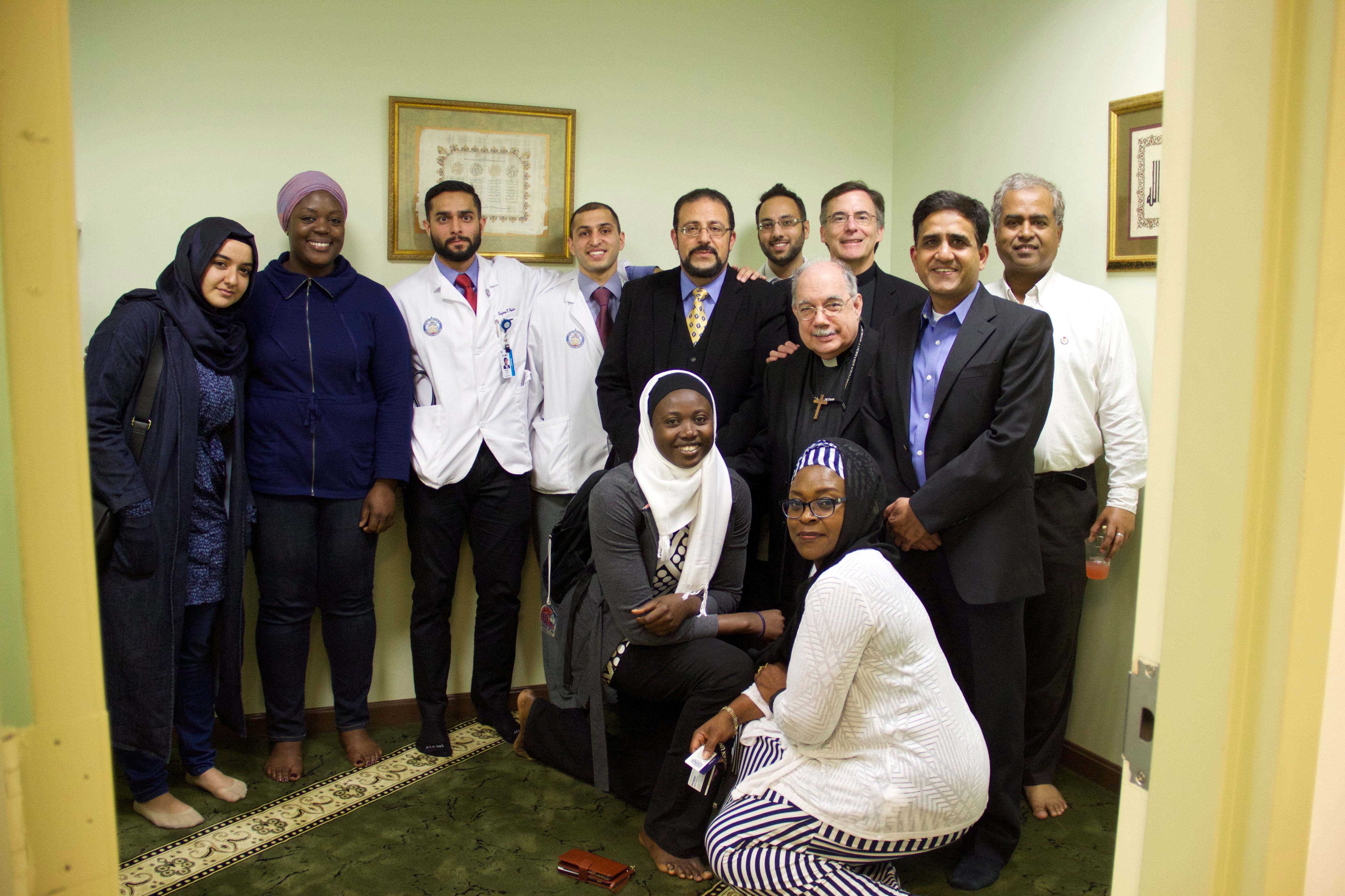 Students and Imam Heidi in the Muslim Prayer Room 