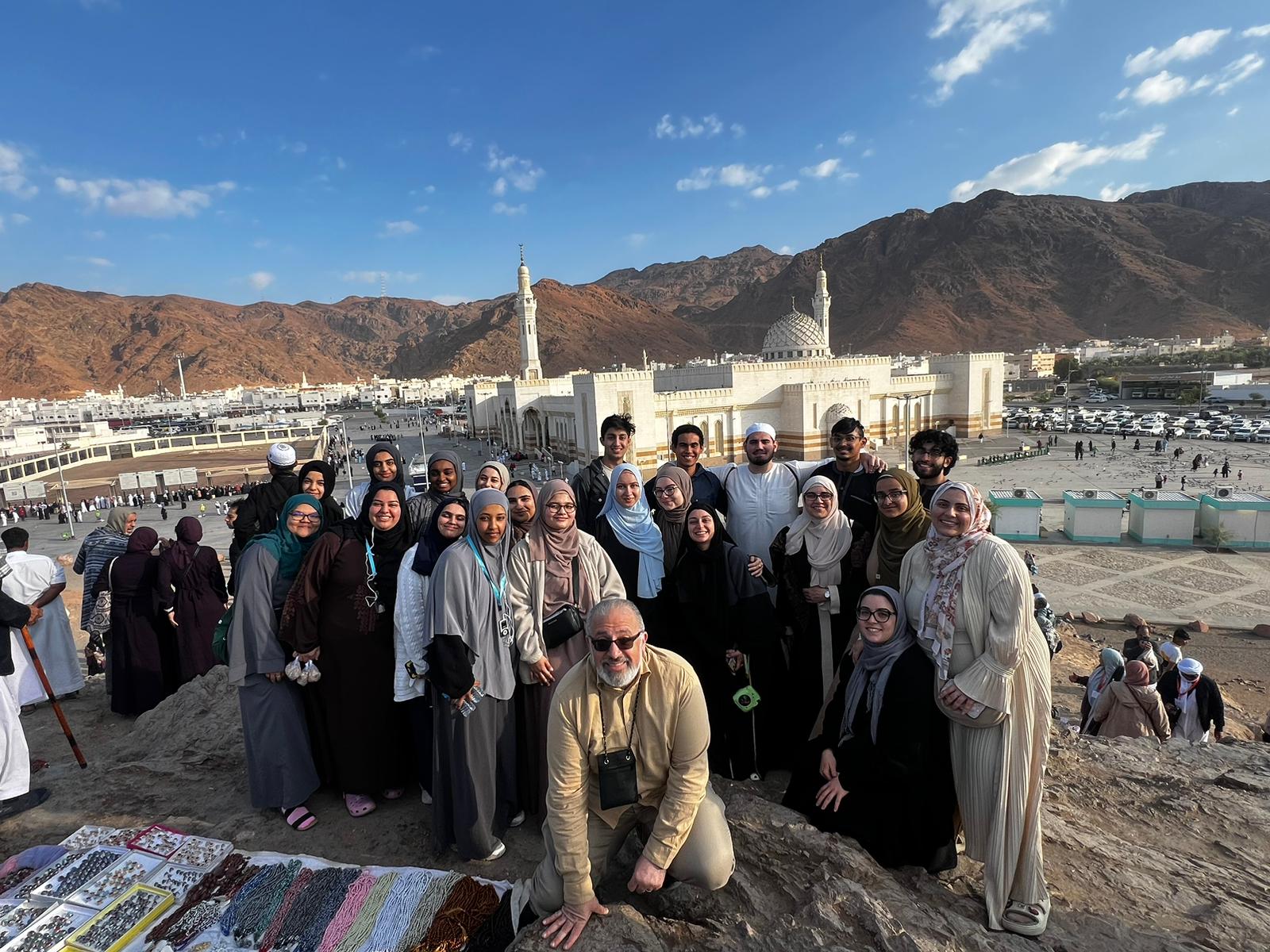 Group photo in front of the Sayed Al-Shuhada Mosque.