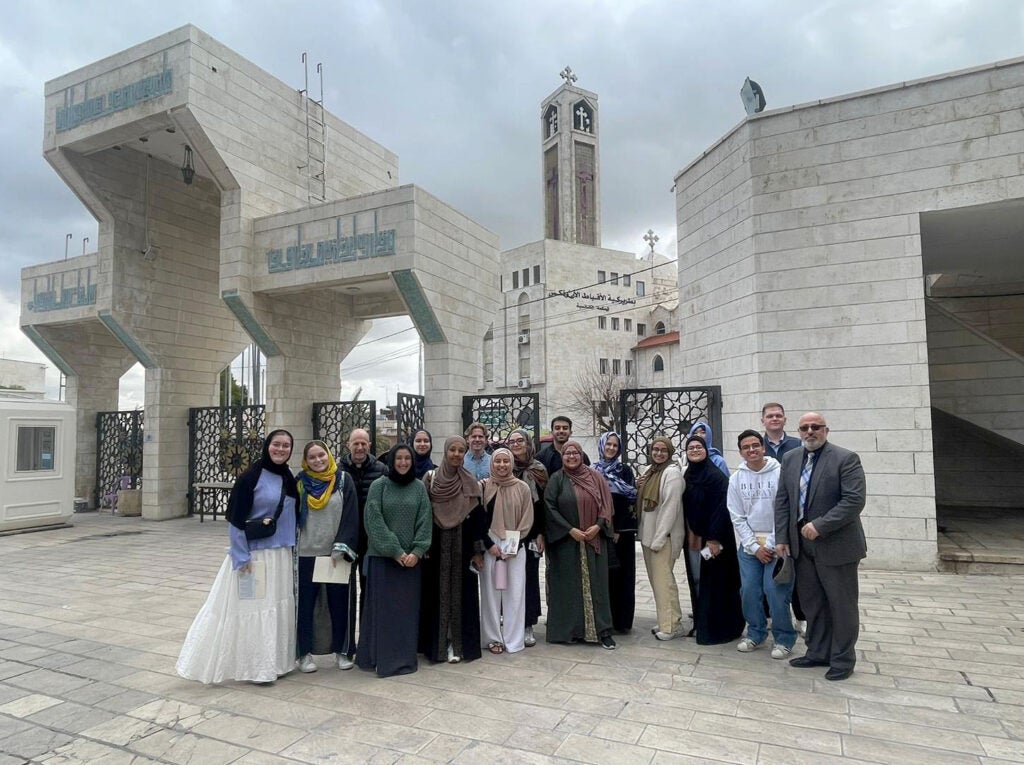 Students in front of a mosque