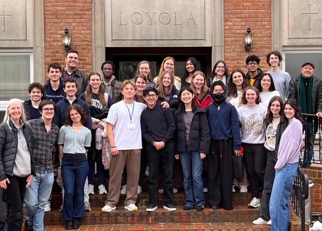 A group of student pose at the 2025 Be Still and Rest in God retreat