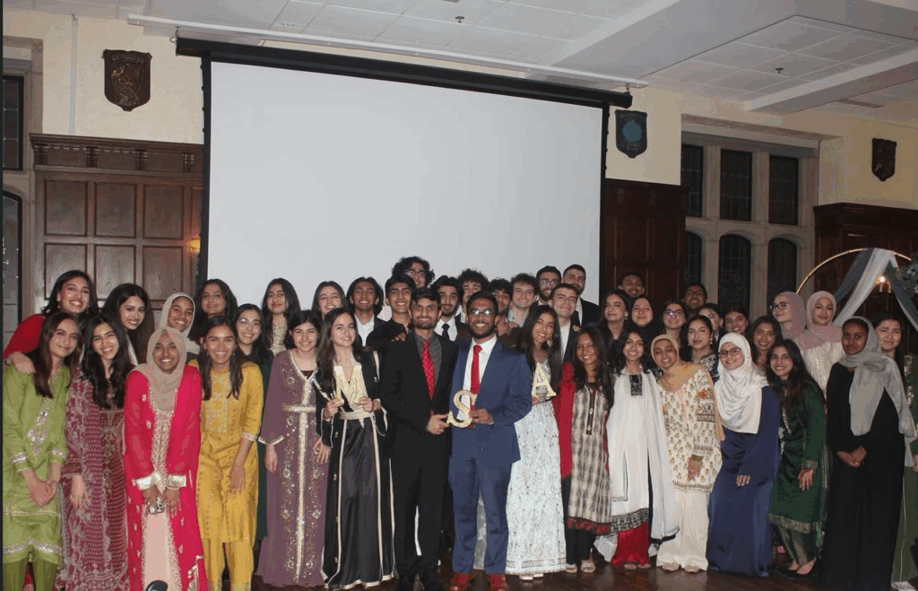 Saara Bidiwala (C’26), second from left in the front row, at a Muslim Student Association formal.