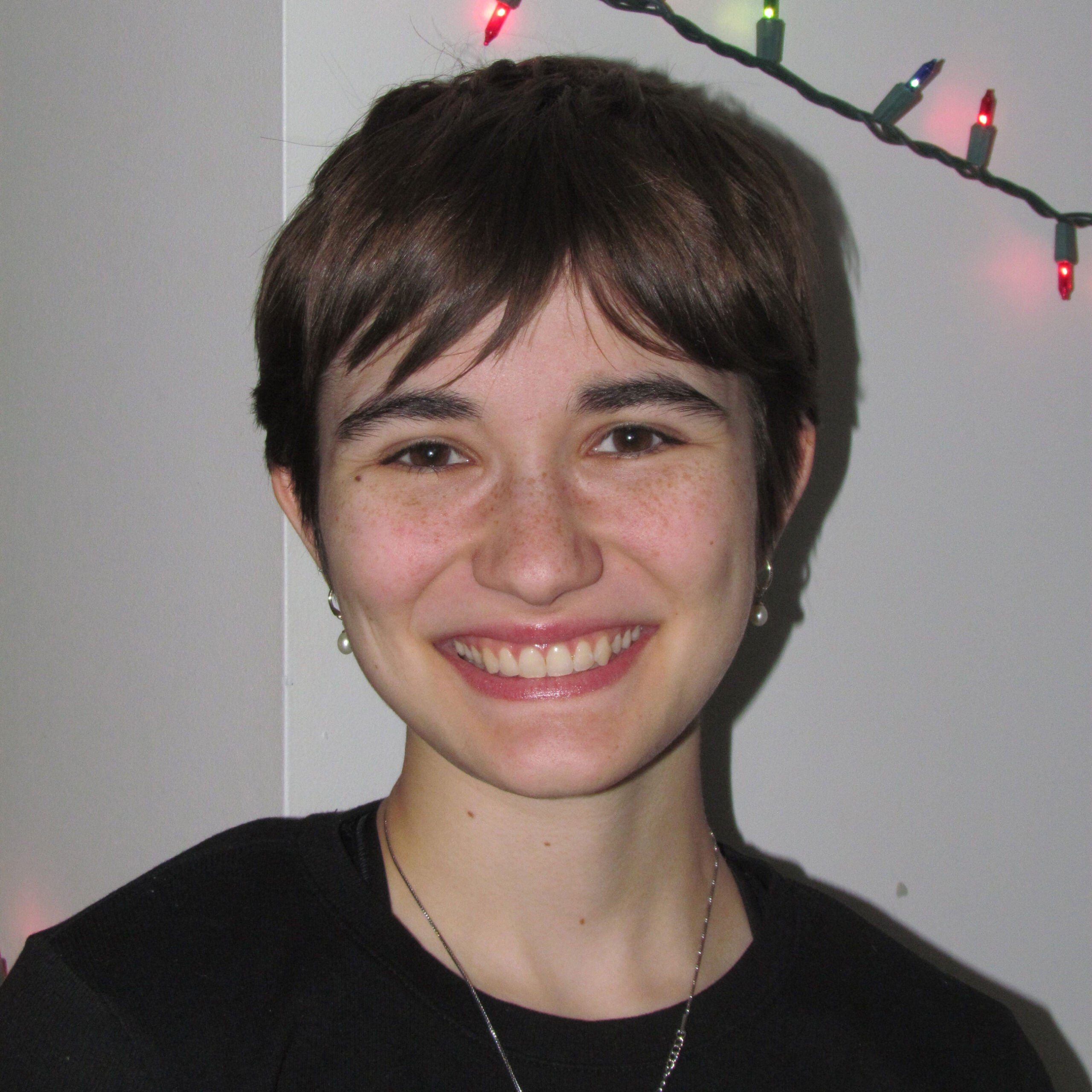 Headshot of Elle Marinello, Escape leader