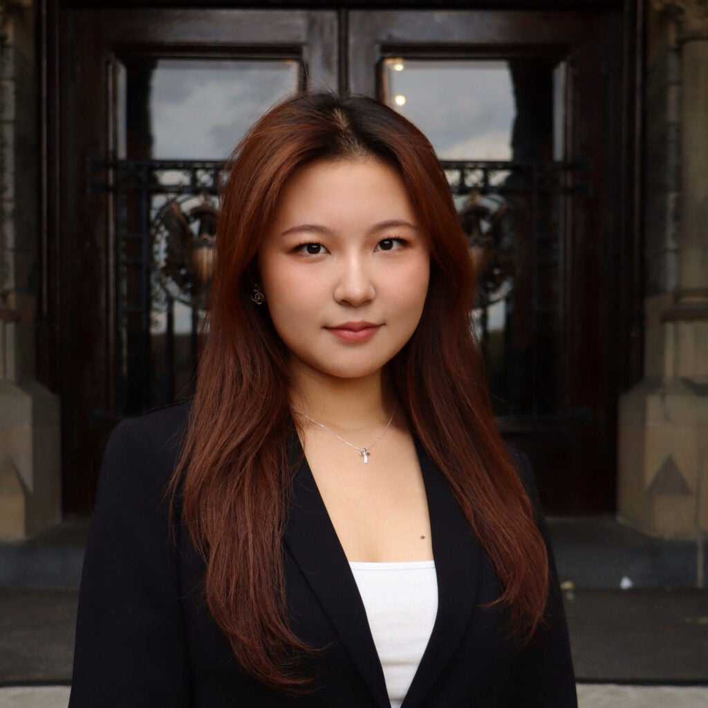 Headshot of Iris Cho, Escape leader